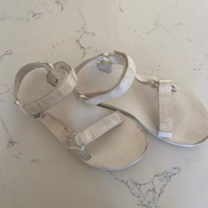 White Teva sandals